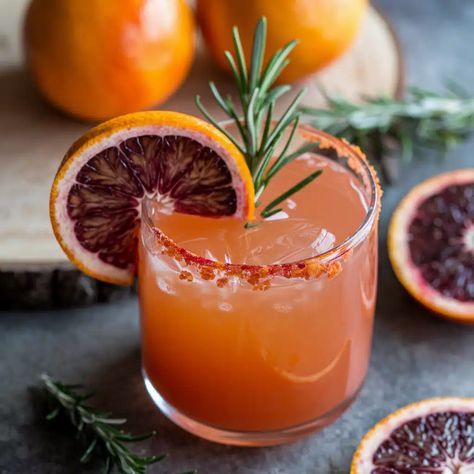 Blood Orange Mocktail Citrus Mocktail, Thanksgiving Mocktails, Blood Orange Mocktail, Orange Mocktail, Winter Mocktails, Cranberry Fizz, Christmas Mocktails, Mojito Mocktail, Spiced Apple Cider