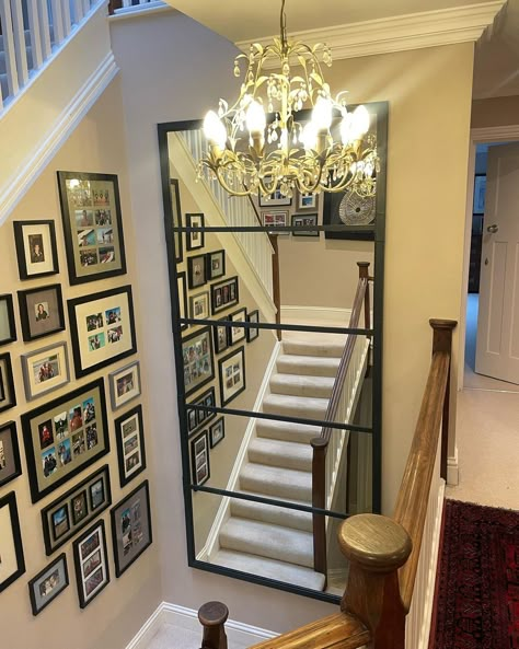 Large mirror wall mounted to enhance and reflect our clients stairway landing area. Viewed from three stairway points it certainly opened… | Instagram Mirror At Bottom Of Staircase, Up Stairs Hallway Decor, Frames Going Up Stairs, Staircase Wall Mirror, Tall Ceiling Stairway Decor, Mirror Wall Decor Stairs, Mirror Above Stairs, Mirrors On Staircase Wall, Mirror Stairway Wall