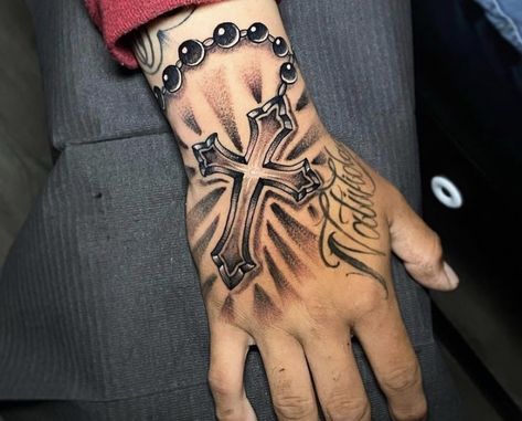 Hand Tattoos For Guys Cross, Rosary Tattoo For Men Arm Half Sleeves, Cross With Crown Of Thorns Tattoos For Men, Biblical Hand Tattoos For Men, Hand Tattoos Rosary, Christian Hand Tattoos For Men, Rosary On Hand Tattoo, Small Hand Tattoos For Guys For Men, Christian Hand Tattoos For Guys