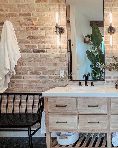 Comment MASTERBATH ✨A little master bathroom love today! All the details of the space are below. . I LOVE this room and how all of the pieces came together. Here are all of my favorites… 1. The HUGE 84” vanity in whitewashed teak with the open storage in the bottom. It’s just lovely and was one of the few options that we could find that would fit the space well. 2. I LOVE the brick wall and it really ties together with the brick herringbone floor in our foyer. 3. Third is the wooden stum... Brick Wall Bathroom, Brick Herringbone Floor, White Washed Brick, Brick Herringbone, White Wash Brick, Wall White, Herringbone Floor, Wall Bathroom, The Brick