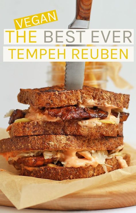 A vegan tempeh reuben made with marinated tempeh, creamy Russian dressing, and sauerkraut sandwiched between two pieces of seedy rye bread #vegan #tempeh #veganrecipes #vegansandwiches Tempeh Reuben, Vegan Reuben, Sauerkraut Sandwich, Reuben Recipe, Marinated Tempeh, Vegan Tempeh, Vegan Sandwich Recipes, Pastas Recipes, Tempeh Recipes