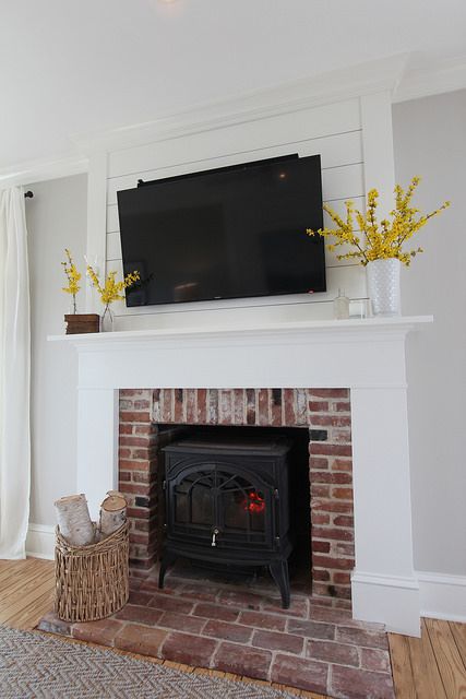 A Custom DIY Fireplace Mantel Beneath Our Shiplap White Mantle, Diy Fireplace Mantel, Red Brick Fireplaces, Brick Fireplace Makeover, Shiplap Fireplace, Living Room Fireplace, White Fireplace, Farmhouse Fireplace, Faux Fireplace