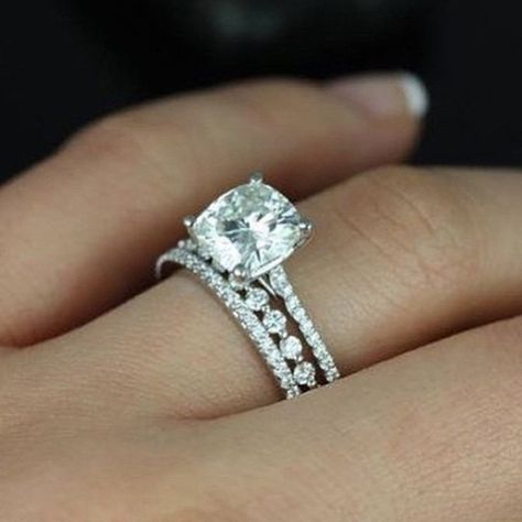 We are loving the mix and match stackable band trend! Check out this subtle shared prong band setting off the gorgeous cushion center stone and marching band. Like? ❤️ #padisbride #engagementring #bling #weddingband #weddingbands #diamonds #whitegold #jewels #engaged #wedding #jewelry #platinum #sfbride #shoplocal #round #sopretty #jewelrygram #jewelryaddict #loveislove #sparkle #theknot #ido Put A Ring On It, Dream Ring, St Michael, Bridal Sets, Morganite, Moissanite Engagement, Bling Bling, Ring Verlobung, Perfect Wedding