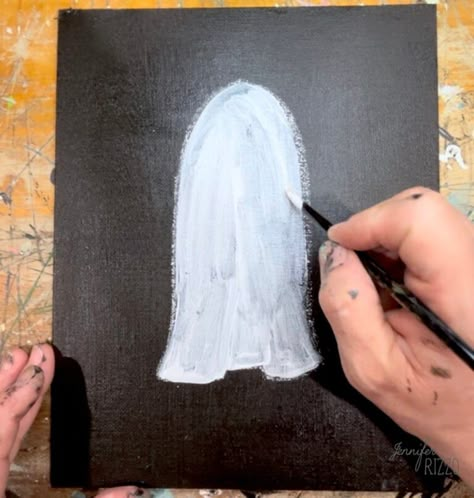 How to Paint a Ghost on an Old Thrift Store Painting - Jennifer Rizzo Ghost Painted On Old Paintings, How To Paint A Ghost Easy, Painting Ghosts On Canvas, Halloween Painting Makeover, Ghosts Painted On Pictures, Painting Over Pictures Thrift Stores, Antique Ghost Painting, How To Paint A Ghost Step By Step, How To Paint Ghosts On Paintings