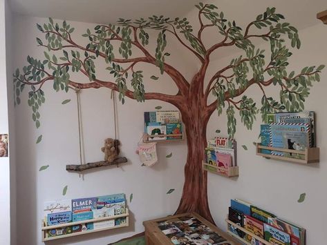 Painting Tree On Wall, Tree Painting Nursery, Painted Tree In Corner Of Room, Diy Mural Nursery, Tree In Nursery Room, Playroom Tree Mural, Corner Tree Mural, Daycare Painting Ideas, Treehouse Nursery Theme