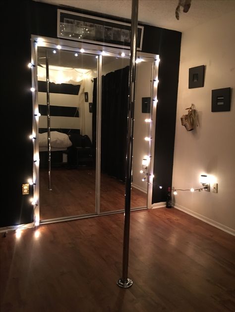 Home pole studio Xpole + Target lights 8in. Gold pleasers Strip Pole In House, Pole Bedroom Ideas, Pole Home Studio, Dancing Pole In House, Pole Studio Decor, Pole Dancing Studio, Pole Dance Home Studio, Pole Room Decor, At Home Dance Room