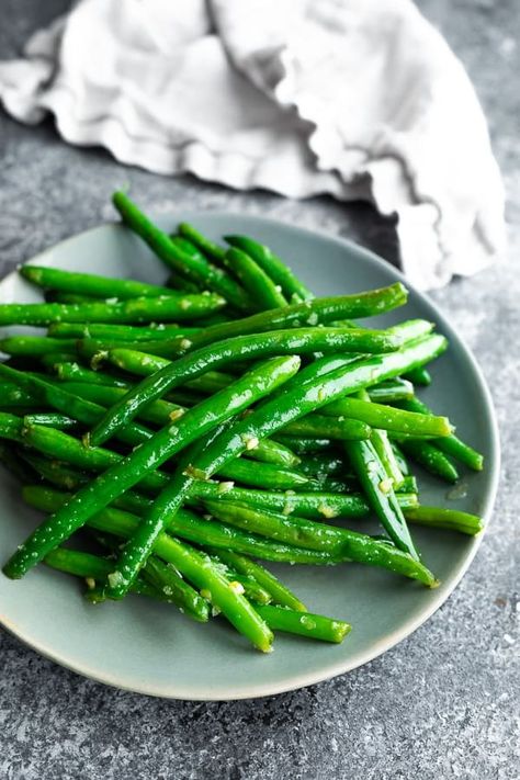 Sautéed green beans with garlic butter is a classic and easy side dish! Made with 4 simple ingredients, it comes together in 10 minutes. Sauteed Green Bean Recipes, Low Carb Meal Prep Recipes, Green Beans With Garlic, Sauteed Greens, Sauteed Green Beans, Garlic Green Beans, Frozen Green Beans, Fresh Green Beans, Green Bean Recipes