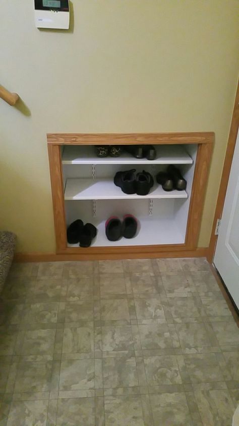 Split Level Shoe Storage Shelf built in to wall to provide shoe storage for small split entry, using 2x4s, 1/4 inch plywood,  and channel lock shelving. Split Entry Remodel, Split Level Entryway, Shoe Storage Small Space, Split Level Remodel, Entryway Stairs, Ikea Shoe, Split Foyer, Entryway Shoe Storage, Shoe Storage Shelf