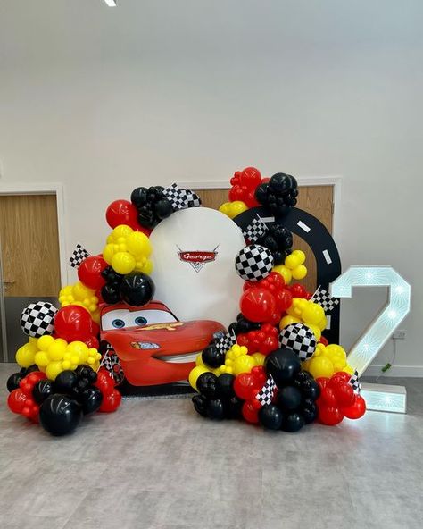 EVERY OCCASION EVENTS • BALLOON & EVENT STYLIST CHESHIRE on Instagram: "GEORGE’S 2nd BIRTHDAY 🚗 A Cars inspired display for George’s 2nd birthday complete with picnic for 16 children. What theme would your child choose? #carsparty #lighteningmcqueen #birthdayparty #2ndbirthday #kidspartydecor #disneycars #kidspartyballoons @kalisanballoons @kalisanuk @balloon_world_nwgreetings_uk" Cars Theme Balloon Decoration, Cars Backdrop Ideas, Mcqueen Balloon Decor, Cars Birthday Balloons, Lighting Mcqueen Decorations, Lightning Mcqueen Balloon Arch, Car Theme Balloon Decoration, Car Theme Birthday Decor, Cars Balloon Garland