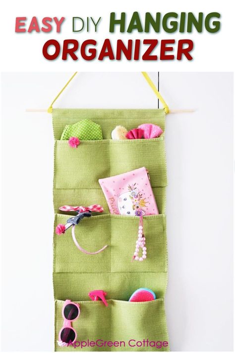 Diy Hanging Organizer, Diy Mail Organizer, Wall Mail Organizer, Hanging Storage Pockets, Wrapping Paper Organization, Diy Mail, Wand Organizer, Diy Organizer, Over The Door Organizer