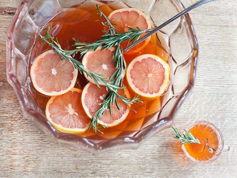 In addition to being gorgeous, this punch has a delicate, fresh flavor: the sweetness from bourbon, honey, and sparkling wine is well-balanced by tart, fresh grapefruit and rosemary-laced Aperol. Best Punch Recipe, Rosemary's Baby, Batch Cocktails, Punch Drinks, Thanksgiving Cocktails, Holiday Punch, Fall Cocktails, Milk Shakes, Serious Eats