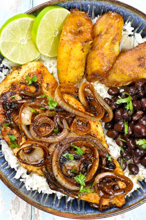 Cuban chicken breast in a bowl along with white rice, black beans and plantains. Black Beans Dishes, Cuban Grilled Chicken, Cuban Chicken Marinade, Chicken Fricassee Cuban, Cuban Chicken Black Bean Rice Bowl, Cuban Pollo Asado Recipe, Different Chicken Breast Recipes, Cuban Bowl Recipe, Spanish Rice Bowl