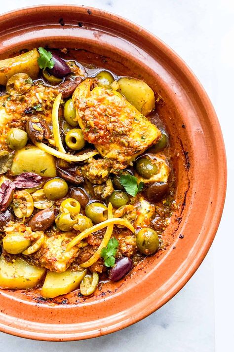 Fish Tagine with Chermoula Sauce - Feast with Safiya Fish Tagine Moroccan, Moroccan Fish Tajine, Tagine Photography, Moroccan Fish Tagine, Tajin Recipes Morocco, Fish Tagine Recipes, Moroccan Lunch, Moroccan Fish Recipe, Moroccan Tajine