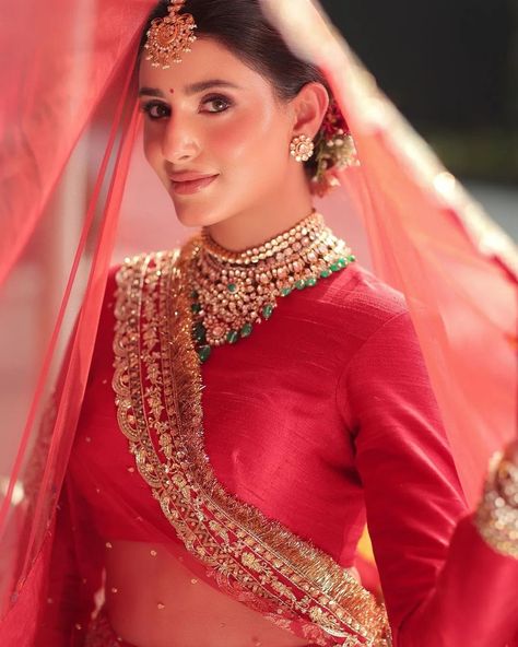 Swooning over this bride's Anand Karaj look! Makeup @gurleenkaurpannu_mua Hair @gaurpaswanofficial Outfit @pitambarabymanisha Jewelry @vinantimanji Styled by @alvirarego For latest wedding trends, bridal and groom trends, decor tips and more, stay tuned to ShaadiWish! bride , groom , wedding , shaadiwish , wedding planning , wedding ideas , trending #weddingideas #weddings #weddingday #shaadi #bride #groom #couplegoals #shaadiwish Red Sari Look, Anand Karaj Bride, Anand Karaj Outfit, Groom Trends, Sari Look, Peplum Top Outfits, Red Sari, Anand Karaj, Elegant Dressing