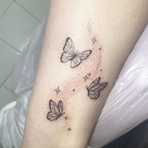 Butterflies Turned To Dust Tattoo, Butterfly Sparkle Tattoo, Butterfly Tattoo With Sparkles, Butterfly And Stars Tattoo, Whimsical Butterfly Tattoo, Butterfly Twinkle Tattoo, Tiny Butterfly Tattoo With Stars, Butterfly Sparkles Tattoo, Butterfly Tattoo Sparkles