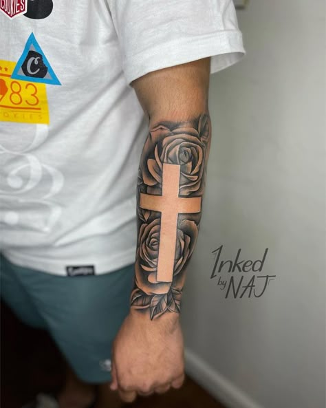 Cross And Family Tattoo, Forarm Tattoos Cross, Forearm Tattoo Men Sleeve Cross, Front Forearm Tattoos Men, Roses With Cross Tattoo, Cross Forearm Tattoo Men, Tattoo Ideas For Men Cross, Forearm Cross Tattoo Men, Cross Tattoo Sleeve