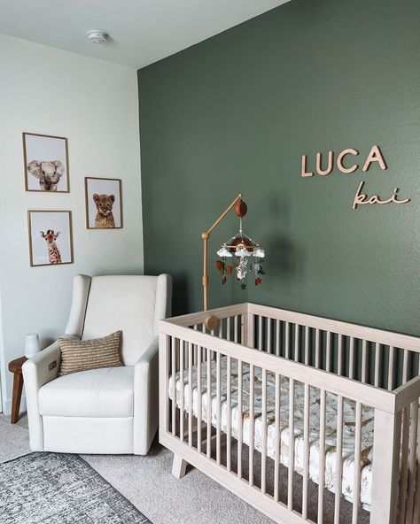 *gasp* it’s gorgeous! I love the way this nursery was styled with our maple name sign to pop on the green walls. And those animal prints are adorable! What is your favourite part of a nursery? #nurserytheme #animaltheme #greennursery #boynursery #namesuggestions #babyboynames #boynames #namesign #nurserysign #nurserynamesign Nursery Ideas Unisex Gender Neutral, Basement Nursery Ideas, Green Black Nursery, Green Baby Rooms, 2025 Nursery Trends, Olive Baby Nursery, Green Nursery Theme, Forest Green Baby Room Themed Nursery, Boys Green Nursery