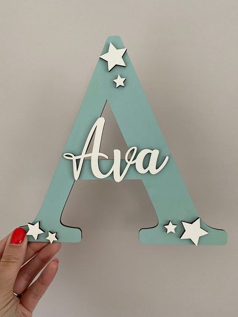 Craft stunning initial wall art using DIY letter decor techniques. Perfect for personalizing doors or creating unique name signs in any room! Diy Letter Decor Initials Wall Art, Diy Letter Decor, Door Name Tags, Big Wooden Letters, Baby Name Wall Art, Door Name Sign, Kids Door Signs, Initial Wall Art, Laser Cut Christmas