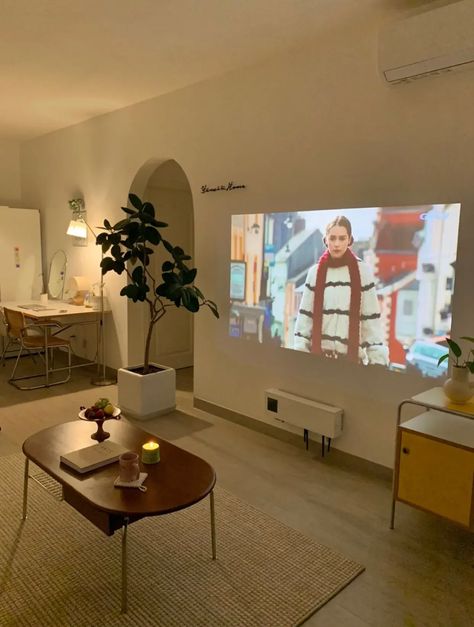 Living Room Tv Area Decor, Projector In Studio Apartment, Living Room Designs With Projector, Nyc Studio Apartment Ideas Small Spaces, Studio Apartment Projector, Projector In Apartment, Projector Living Room Set Up, Small Living Room Projector Ideas, Projector Instead Of Tv Living Rooms