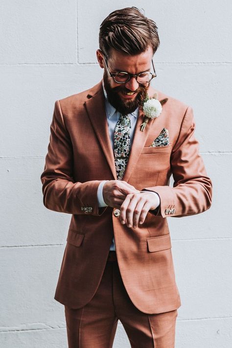 Groom In Orange Coral Wedding Suit Quirky Groom Suit, Boho Wedding Suit Grooms Summer, Orange Suit Men Wedding, Garden Wedding Groom Attire, Garden Wedding Suit, Spring Wedding Suit, Wedding Suit Summer, Trendy Wedding Outfits, Orange Wedding Suit