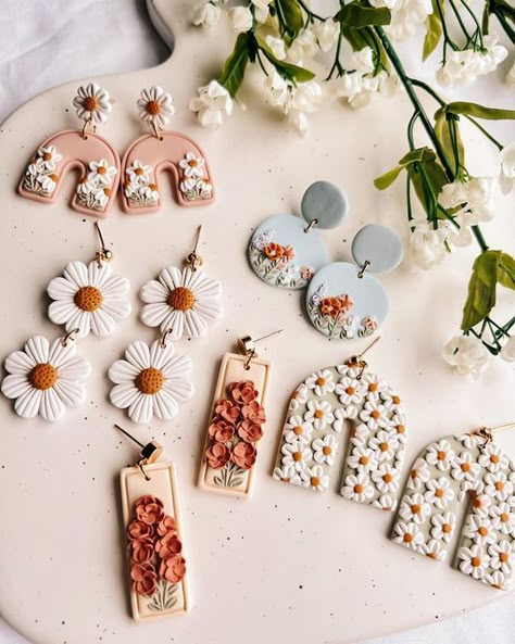 Noelle Earrings on Instagram: "my most favorite collection of all time ✨🌿🌼🌷🌞 launching this Friday at 6 PM EST! Which style is your fave so far? I shared almost every style I’ve made so far to my stories, so head there to see the full collection! #polymerclay #polymerclayearrings #polymerclayartist #polymerclaycreations #clayearrings #polymerclayjewelry #smallbiz #smallbizowner #smallbusinessowner #shopify #shopifyseller #smallbusiness #shopsmall #smallbusinesssupport #youngbusinessowner #bo Polymer Clay Earring Display, Cute Earrings Polymer Clay, Sculpy Earrings Diy, Earrings Made Of Clay, Clay Earring Design Ideas, Earring Polymer Clay, Clay Earring Inspiration, Clay Earrings Spring, Spring Polymer Clay Earring Ideas