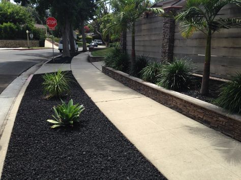 Black rocks Black Stones Landscape, Black Stones For Landscaping, Front Yard Black Rock Landscaping, Black Rocks Backyard, Black Basalt Gravel, Front Yard Landscaping Black Rocks, Black Rock For Landscaping, Gravel And Mulch Flower Bed, Black Yard Ideas