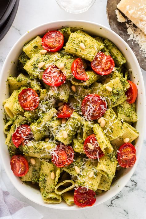 This delicious Pesto Pasta with Roasted Tomatoes features vibrant basil pesto and juicy roasted cherry tomatoes for a delightful combination of flavors – a quick and flavorful dinner option ready in under 20 minutes. Transform your weeknight meals with this easy pasta dinner! Fall Dinners For Two, Recipes For Two People Dinners, Pasta With Roasted Tomatoes, Basil Pasta Recipes, Easy Pesto Pasta, Dinners For Two, Basil Pesto Pasta, Roasted Tomato Pasta, Easy Fall Dinners