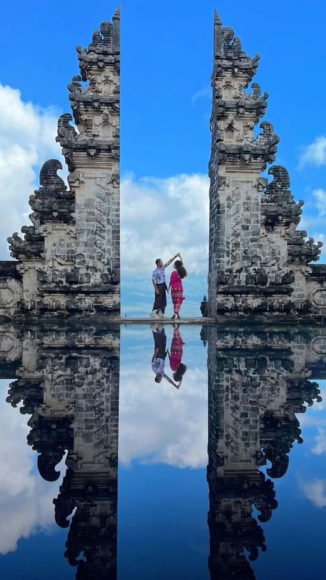 The 15 Best Honeymoon Destinations For a Romantic Getaway | Couple Aesthetic | Couples Travelling Honeymoon Bali Couple Photos, Lempuyang Temple Bali Pose Couple, Gate Of Heaven Bali Poses Couple, Bali Vision Board Pictures, Couple Poses In Bali, Bali Couple Poses, Bali Couple Photo Ideas, Couple Bali Photo Ideas, Bali Couple Aesthetic