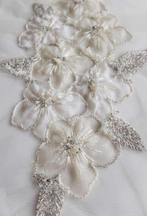 Hand-made motif with applique silk organza flowers #couture #beaded #handembroidery#wedding#sposa#novias#mariage#bridal#accessories#highfashion#atelier Tule Fabric, Tambour Beading, Tambour Embroidery, Motifs Perler, Organza Flowers, Beaded Leaf, Couture Embroidery, Bead Embroidery Patterns, Fabric Applique