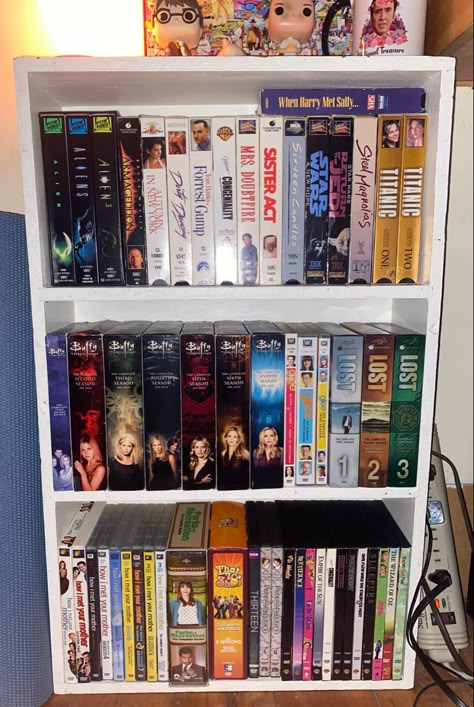 Dvd Shelf Aesthetic, Dvd Collection Display, Dvd Display Ideas, Vhs Shelf, Dvd Collection Aesthetic, 90s Vhs Aesthetic, Copy Aesthetic, Dopamine Room, Dvd Aesthetic