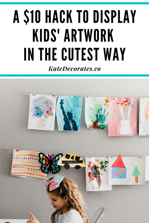 If you're wondering how to display kids wall art at home on the cheap, this quick, $10 wall art display hack is THE most genius solution. Never worry about how to display kids art again ... and your kids will be so thrilled to see all their gorgeous artwork displayed proudly in your home! #kidsdecor #kidsart #kidscrafts #kidsroom #kidsroomdecor #kidsartprojects #homedecor #easydiy Kids Art Display Cable, Kid Art Work Display, Kid Wall Storage, Toddler Art Display Ideas, Hanging Kids Artwork On The Wall, Kids Art Display Wall Hanging Artwork, Diy Art Display Kids, Drawing Display Ideas, How To Hang Kids Art On Wall