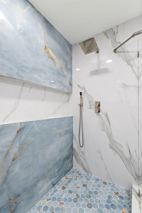 Taupe And Blue Bathroom, Bathroom Tiling Designs, Bathroom Tile Ideas Blue, Bathroom Tiles Blue, Stylish Bathroom Ideas, White Marble Bathroom With Blue Accents, Bathroom Floor And Wall Tile Ideas, Light Blue Marble Bathroom, Blue Marble Shower Walls