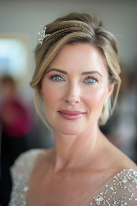 27 Timeless Mother of Groom Hairstyles for the Modern Woman Mother Of The Groom Hair Down, Updos Mother Of The Groom, Wedding Make Up Mother Of The Bride, Make Up For Mom Of The Bride, Side Up Do For Wedding, Mother Of The Groom Hair And Makeup, Modern Updo Wedding, Mob Wedding Makeup, Wedding Makeup For Mother Of Bride