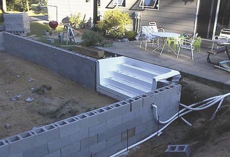 Building your own swimming pool with cement blocks isn’t hard, according to Darrell Buchholz. He built one for a friend, and now sells plans for others to do the same.     “I built a pool for myself ... Diy Pool Steps, Homemade Swimming Pools, Cement Pools, Build Your Own Pool, Swimming Pool Pond, Living Pool, Building A Swimming Pool, Swimming Pool Decks, Swimming Pool Construction