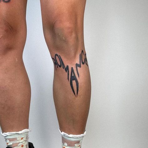 Simple Knee Tattoo Men, Text Knee Tattoo, Two Word Knee Tattoo, Men Shin Tattoo Ideas, Scraped Knee Tattoo, Tattoos For Above The Knee, Knee Font Tattoo, Tattoo For Knee, Word Knee Tattoos