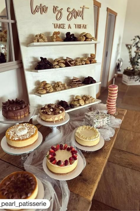 wedding dessert table with cookies and cheesecakes and donuts Simple Wedding Dessert Table, Costco Cheesecake, Cookie Bar Wedding, Dark Romance Wedding, Cheesecake Wedding, Table Set Ups, Wedding Candy Table, Cheesecake Caramel, Cheesecake Wedding Cake