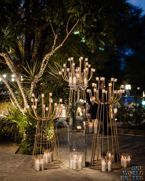 We recreated a mini paradise for the #Phera ceremony where every corner echoed a tale of surreal romanticism and delicate blossoms filled the air with their serene scents. Decor & design: @oneworldunited.in Wedding planner: @unavida_weddings Wedding venue: @alilafortbishangarh Florals: @diamondflorist_jaipur Props & Candles: @shinecollectionbydeepaksharma Furniture: @silverline_rentals 📞 097995 35809 📩 oneworldunitedoffice@gmail.com #wedding #weddingdecor #eventmanagement #decor #ind... Props For Wedding Decoration, Night Outdoor Wedding Decor, Diwali Event Decor, Floral Stage Design, Surreal Romanticism, Cocktail Event Decor, Wedding Cocktail Decor, Diwali Props, Cocktail Night Decor