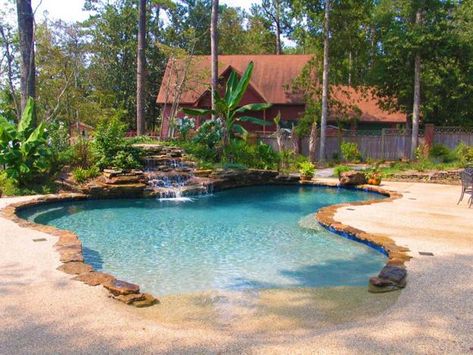 Beach style swimming pools are gorgeous water features that add unique look and comfort to modern yards Vinyl Swimming Pool, Garden Design Ideas On A Budget, Gunite Swimming Pool, Beach Entry Pool, Modern Pool, Swimming Pool Ideas, Backyard Beach, Small Pool Design, Diy Swimming Pool