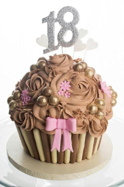 Giant Cupcake with gold Maltesers by MemoryBox Cake Design (see Facebook for details) Cupcake Cakes Birthday, Cake Decorating Ideas Chocolate, Giant Cupcake Recipes, Chocolate Giant Cupcake, Chocolate Fingers, Giant Cupcake Cake, Ideas For Birthday Cake, Giant Cupcake Cakes, Giant Cake