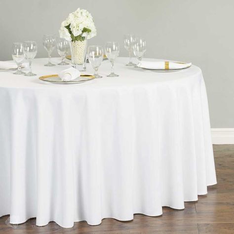 The 120-inch round polyester tablecloth is perfect for 60-inch round tables, a standard rental table size. Delight guests at your wedding reception with this floor-length drop. Easy maintenance - machine washable, dryer safe, stain resistant. Use for multiple events. #SparklesMakeItSpecial #WeddingLinens #ElegantWeddingTablecloths #Tablecloths #DIYWedding #WeddingReception Champagne And Pink Wedding, Diy Wedding Budget, White Round Table, 120 Round Tablecloth, Elegant Wedding Decorations, Wedding Reception Decor Ideas, Reception Decor Ideas, Wedding Reception Design, Tablecloth Sizes