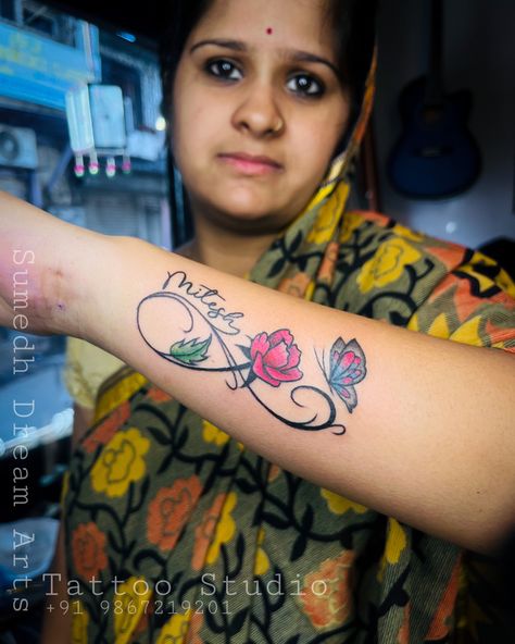 Infinity Rose Name Tattoo ❤️ . Call For Appointment☎️ 9867219201 . Check out more creative tattoos by Sumedh (@sumedh_dream_arts ) . . #besttattoostudio #forearmtattoo #smalltattoos #infinitytattoo #infinite #tattooforever Infinity Rose Tattoo, Rose Name Tattoo, Rose Tattoo Drawing, Infinity Name Tattoo, Last Name Tattoos, Infinite Tattoo, Tattoo Infinity, Kid Name Tattoo, Tattoo For Boyfriend