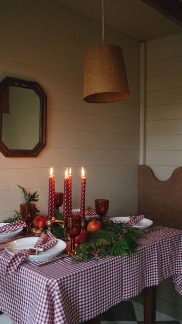 Anita Russell on Instagram: "Simple Christmas tablescape using natural decorative items like evergreen, pomegranate and nuts. I'm all about the traditional Christmas this year and this gingham fabric made the perfect tablecloth and napkins. What's your Christmas style? ✨️ #englishcountrystyle #englishchristmas #nordicchristmas #traditionalcottage #traditionaldecor #traditional #Christmastablescape #tablescape #ginghamtablecloth #setthetable Cottage Style | Christmas Tablescape | Traditional | Rustic Home | Cosy Home | Interior Design | Small Home | Gingham |" Cottage Christmas Table, Gingham Christmas Table, Gingham Tablescape, Christmas Table Cloth Ideas, Gingham Christmas, Simple Christmas Tablescapes, H&m Christmas, Natural Holiday Decor, Xmas Table Decorations