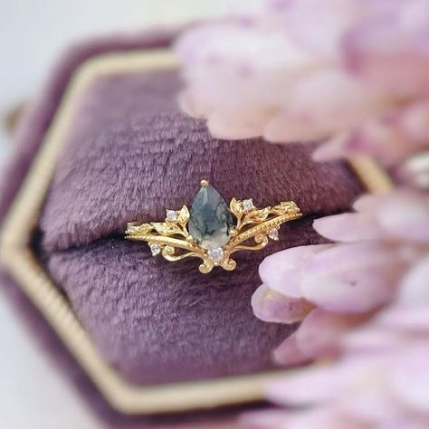 Azura Jewelry New York on Instagram: "Let the beauty of nature speaks to us through our Lotus Moss Agate Ring.🍃 A captivating aura we simply can't just resist. Tag a nature lover friend who will fancy this unique gemstone jewelry. 💫" Fairy Engagement Ring Gold, Moss Agate Engagement Ring Gold, Elven Wedding Ring, Whimsical Rings, Whimsical Wedding Ring, Whimsical Engagement Ring, Elven Ring, Whimsical Ring, Agate Wedding Ring