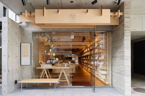 The wood sign with its small simple logo above this tea shop in Japan looks clean and natural against the concrete building it's attached to. Japanese Coffee Shop, Dressing Design, Japanese Shop, Japan Store, Tea Store, Interior Vintage, Shop Front Design, Indie Room, Retail Design Blog