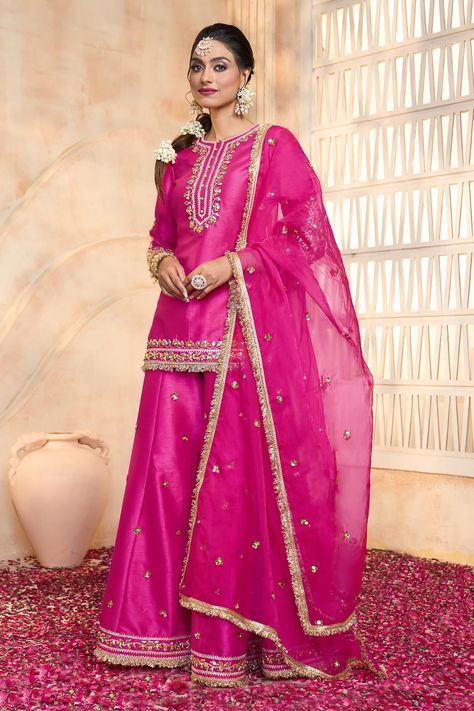 Shop for these amazing collections of Fuchsia Kurta And Sharara Dupion Embroidered Gota Round Floral Set For Women by Preeti S Kapoor online at Aza Fashions. Short Kurta With Skirt, Short Kurta Plazo Design, Short Kurta With Plazo, Skirt Plazo Design, Plazo With Short Kurti, Suit With Lace Design, Elegant Royal Dresses, Garara Design, Colorful Style Outfits