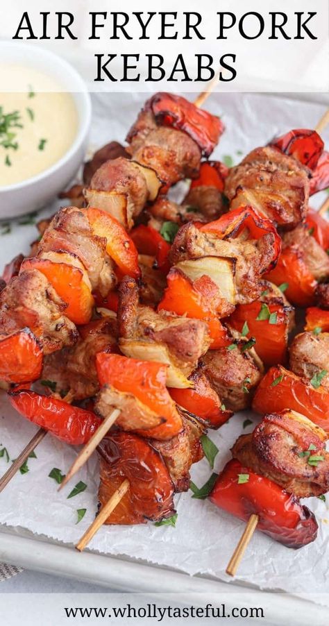 These juicy and delicious Pork Kebabs can be made in the air fryer or oven. Lean pork tenderloin cubes are marinaded in paprika, olive oil and fresh garlic, and then layered with red bell peppers, onions and bacon and cooked to perfection. Served with creamy mustard maple dipping sauce! Maple Dipping Sauce, Air Fryer High Protein, Cubed Pork Recipes, Fried Pork Tenderloin, Pork Kabobs, Pork Kebabs, Tasteful Recipes, Dinners Ideas, Air Fryer Pork