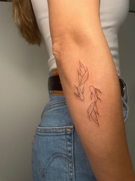 Meaning Of Koi Fish Tattoo, Two Beta Fish Tattoo, Dainty Coy Fish Tattoo, 3 Small Tattoos In A Row, Word Coverup Tattoo Ideas, Colour Fine Line Tattoo, Back Of Arm Small Tattoo, Koi Fish Elbow Tattoo, Koi Fish Leg Tattoo Women