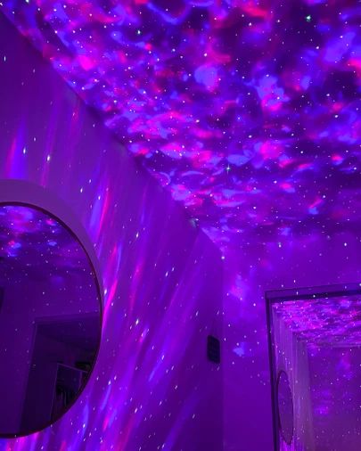 OBSESSED with my galaxy light projector from Amazon, and it’s on sale! http://liketk.it/35odx #liketkit @liketoknow.it #LTKsalealert #LTKhome Galaxy Light Projector, Aurora Projector, Deco Violet, Projector In Bedroom, Galaxy Bedroom, Galaxy Room, Purple Led Lights, Purple Room Decor, Galaxy Light