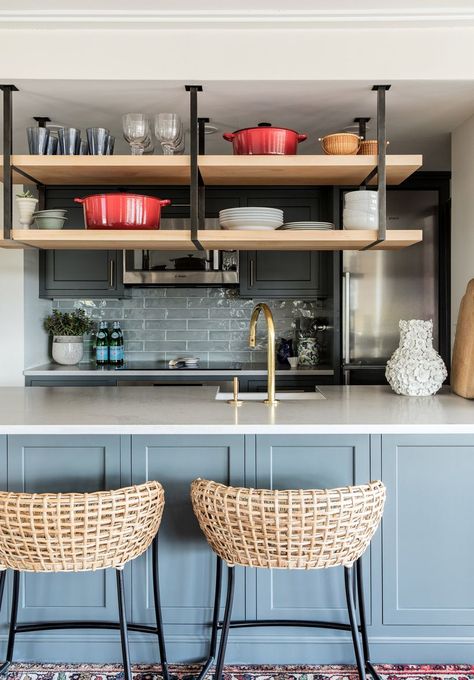 Contemporary Black Kitchen, Hanging Shelf Kitchen, Contrasting Kitchen Island, Concrete Kitchen Island, Suspended Shelves, Green Kitchen Walls, Gray Tile Backsplash, Ceiling Shelves, Traditional Shelves