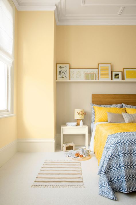 Tap into lighter shades of softer yellow if you're after something more muted. It will refresh your space while also appearing to make your bedroom feel much bigger. Top tip: add in some brighter yellow accessories to accentuate the space. (Photo: Crown) #bedroomideas #bedroomdecor #bedroomdecoratingideas #yellowgold Yellow Bedroom Paint, Yellow Bedroom Walls, Yellow Bedroom Decor, Yellow Bedding, Yellow Room, Yellow Bedroom, Bedroom Paint Colors, Trendy Bedroom, Yellow Walls